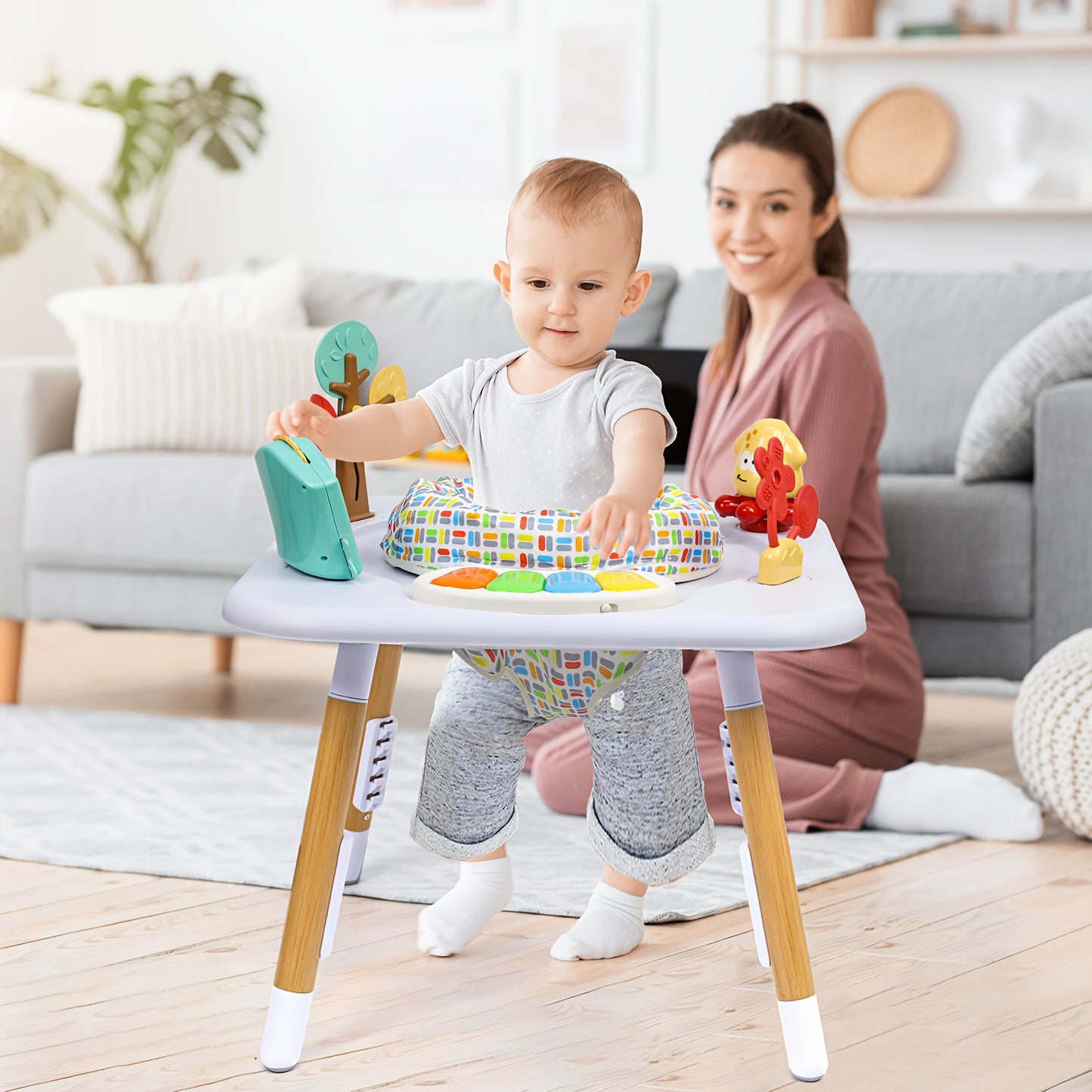 White Baby Activity Center With Five Interactive Toys Adjustable Height Levels Foldable Music Jumper Cushioned Surface
